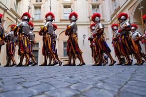 New recruits of the Vatican's elite Swiss Guard march before their swearing-in ceremony at the Vatic