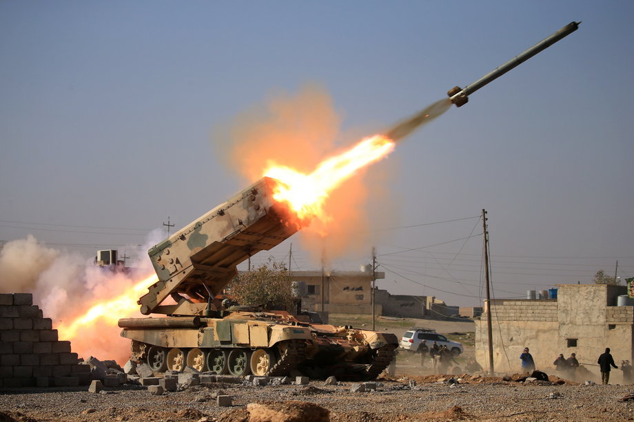 Iraqi army launch a rocket toward ISIS positions during a battle with IS militants near Ghozlani military complex, south of Mosul, Iraq, February 23, 2017.