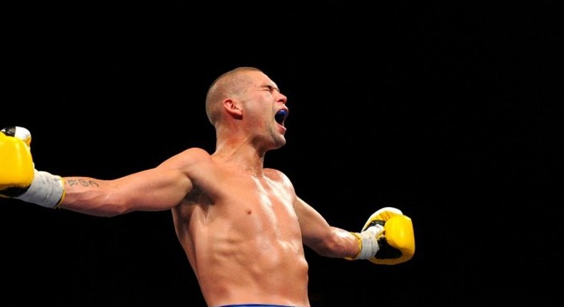 Britain's Tony Bellew retained his World Boxing Council cruiserweight title with a third-round stoppage of BJ Flores at the Echo Arena in Liverpool