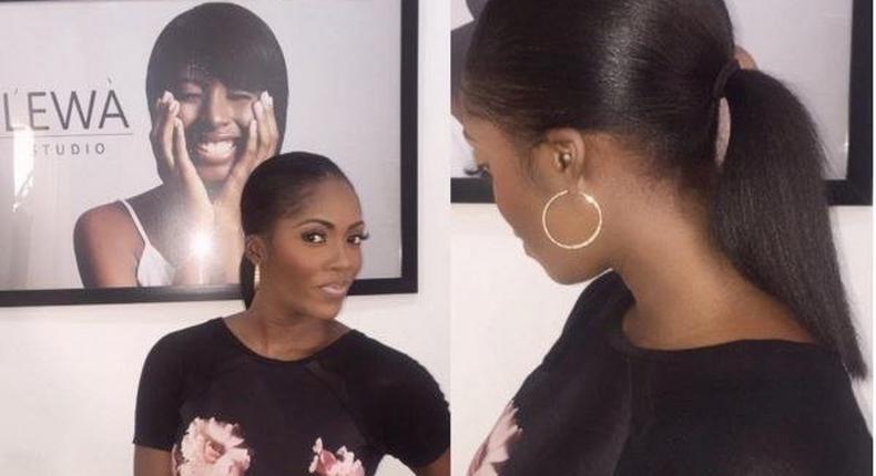 Tiwa Savage flaunting her hair. 