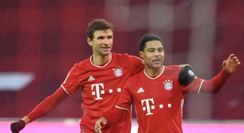 Thomas Mueller (L) and Serge Gnabry (R) returned to Bayern Munich training on Thursday