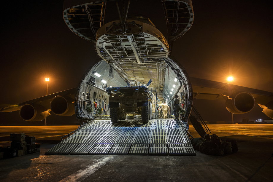More than 266,000 pounds of cargo and armored vehicles are seen loaded into a C-5 in Afghanistan.