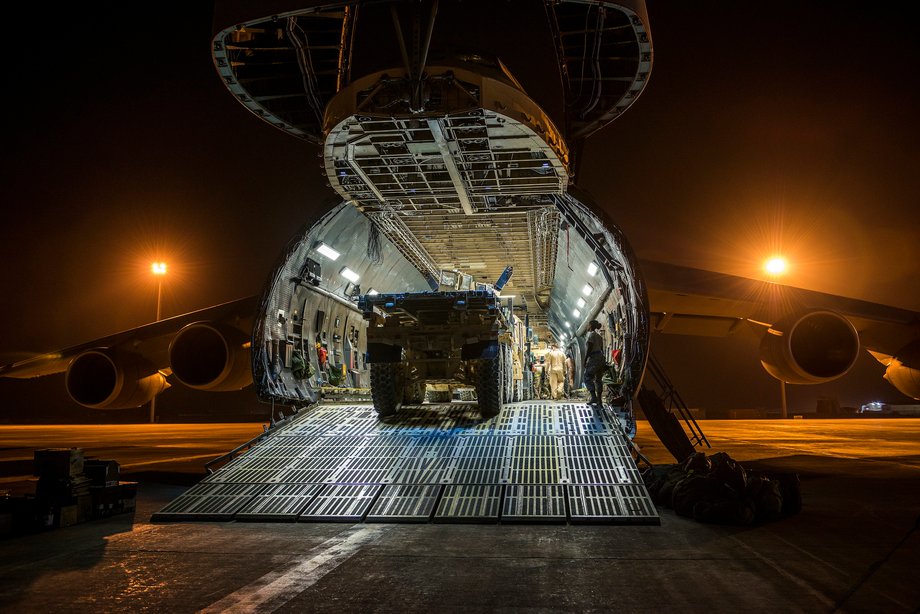 More than 266,000 pounds of cargo and armored vehicles are seen loaded into a C-5 in Afghanistan.