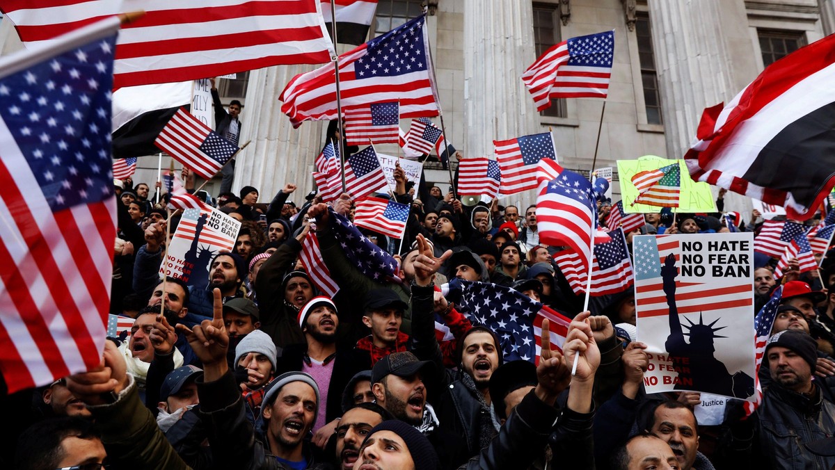 Demonstrators participate in a protest by the Yemeni community against U.S. President Donald Trump's