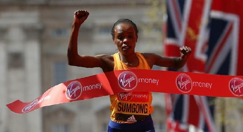 Kenya's Jemima Sumgong crosses the finish line to win the 2016 London Marathon