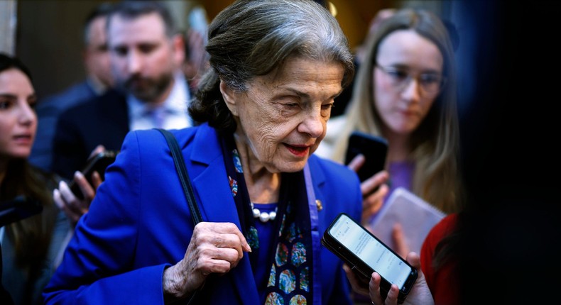 Democratic Sen. Dianne Feinstein of California is surrounded by reporters as she heads to the Senate chamber for a vote in the US Capitol on February 14, 2023 in Washington, DC.Chip Somodevilla/Getty Images