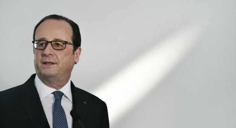 French President Francois Hollande holds a press conference during a visit of The Louvre Abu Dhabi on December 3, 2016