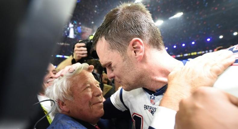 New England Patriots owner Robert Kraft (L) and Tom Brady of the New England Patriots celebrate winning Super Bowl 51 on February 5, 2017