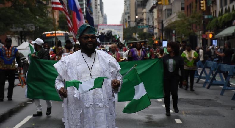 (Front) Mr Solomon Adelaja, Public Relations Officer, Organisation for the Advancement of Nigerians (OAN) leading the 2022 edition of Independence Day Parade on Saturday in New York.