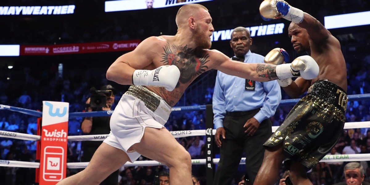 A fan at the Mayweather-McGregor fight snuck down into $25,000 seats and sat among celebrities