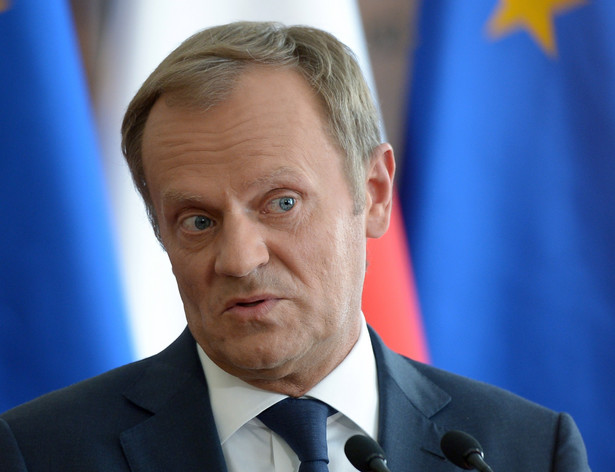 Tusk przyznał, że rozmawiał z Belką o Amber Gold