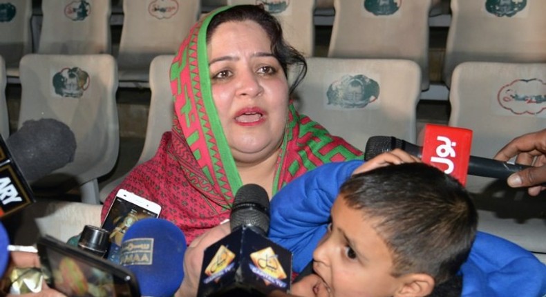 Pakistani mother Rohina Kiani holds her son Ifthikar Ahmed after he was handed over by an Indian official at the Wagah border, on February 4, 2017