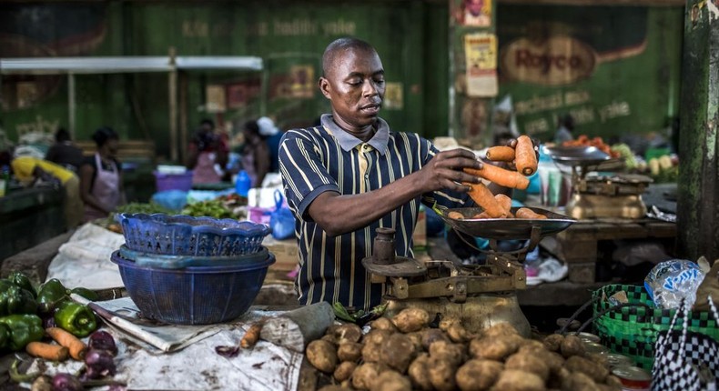 A market trader in Mombasa, Kenya.