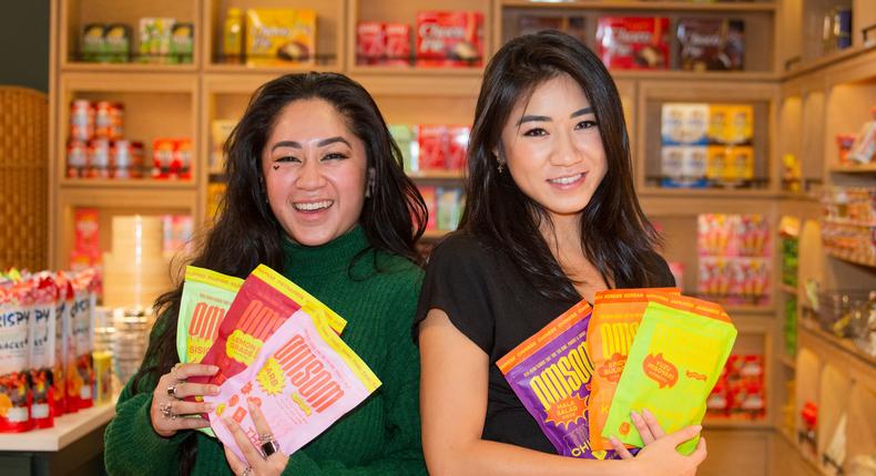 Kim (left) and Vanessa Pham with their Omsom food starter packs at Essex Market.Crystal Cox/Insider