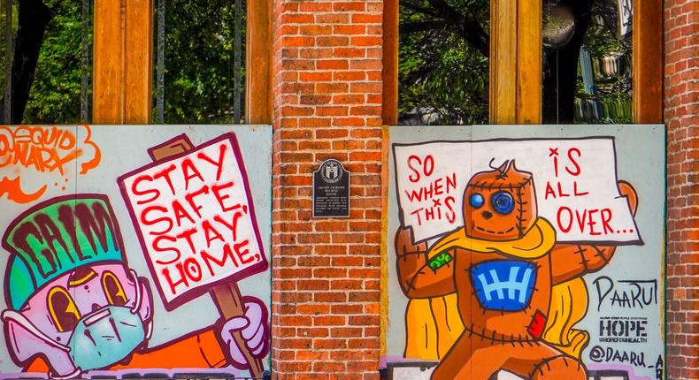 austin texas sixth street empty coronavirus stay home policy murals