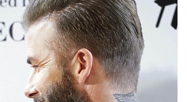 David Beckham shaves off bushy beard