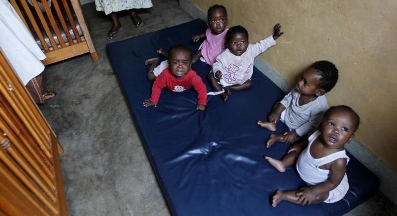 Abandoned children play at the Don Bosco Ngangi community center in Goma, North Kivu region, August 6, 2013. REUTERS/Thomas Mukoya