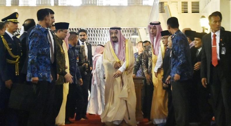 Saudi Arabia's King Salman bin Abdul Aziz (C) is making the first visit by a Saudi monarch to Indonesia in almost 50 years as part of a tour of Asia