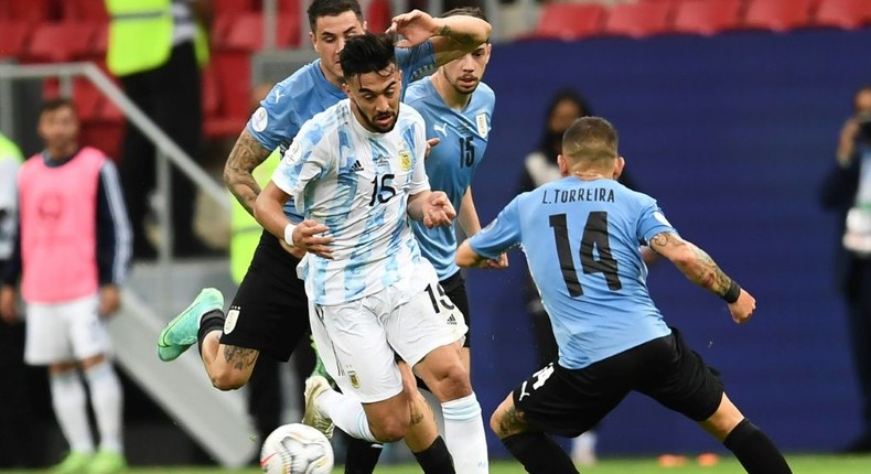 Nicolas Gonzalez (L) in action at the Copa America with Argentina. Creator: EVARISTO SA