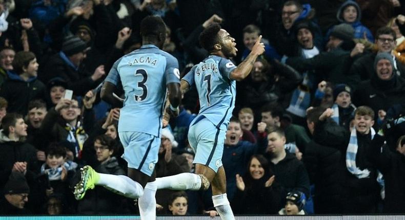 Manchester City's midfielder Raheem Sterling (R) celebrates scoring on December 18, 2016