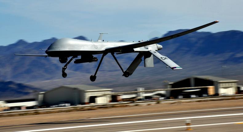 An MQ-1 Predator flies above the flight line during launch and recovery training at Creech Air Force Base, Nev.US Air Force photo by Senior Master Sgt. Cecilio Ricardo