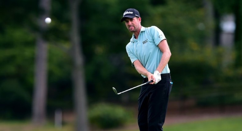 Webb Simpson of the US plays his third shot on the ninth hole during the second round of the Wyndham Championship, at Sedgefield Country Club in Greensboro, North Carolina, on August 18, 2017