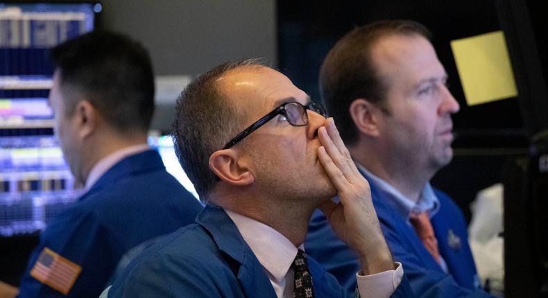FILE - In this Jan. 2, 2020, file photo traders monitor stock prices at the New York Stock Exchange. Over the next few weeks, companies across the country will be telling investors how much profit they made in the last three months of 2019. (AP Photo/Mark Lennihan, File)