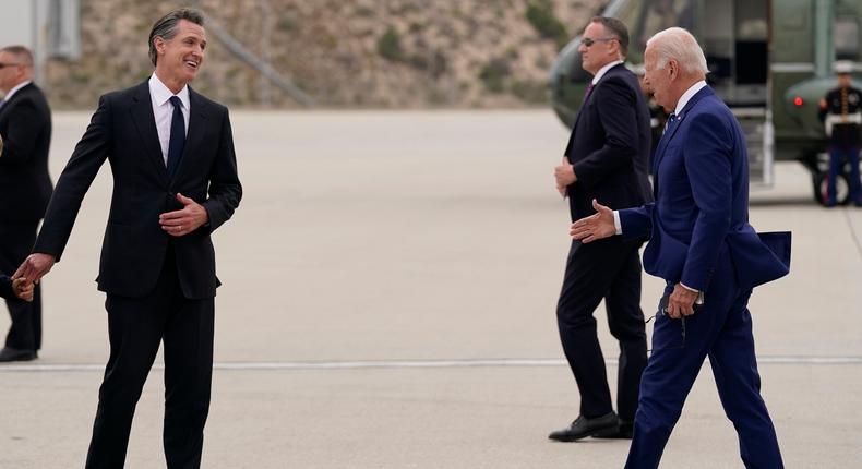 President Joe Biden, right, greets California Gov. Gavin Newsom after arriving at Los Angeles International Airport to attend the Summit of the Americas in Los Angeles on June 8, 2022.AP Photo/Evan Vucci