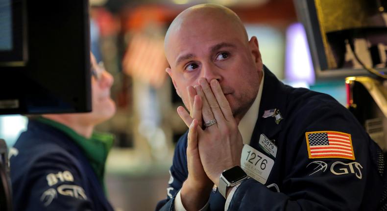 A trader works during the Fed rate announcement on the floor at the New York Stock Exchange (NYSE) in New York, U.S., March 20, 2019.Reuters/Brendan McDermid