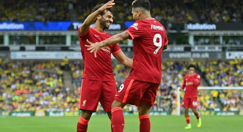 Mohamed Salah congratulates Roberto Firmino at Norwich on the opening day of the Premier League season Creator: JUSTIN TALLIS