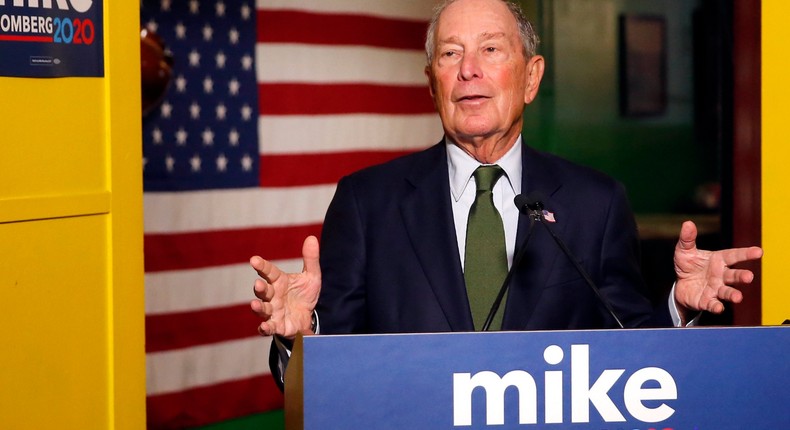 FILE - In this Nov. 26, 2019, file photo, Democratic presidential candidate Michael Bloomberg speaks to the media in Phoenix. Democrats are narrowing Donald Trump's early spending advantage, with two billionaire White House hopefuls joining established party groups to target the president in key battleground states that are likely to determine the outcome of next year's election.(AP Photo/Rick Scuteri, File)