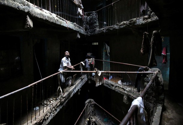 The Wider Image: Tearing down condemned homes in Nairobi