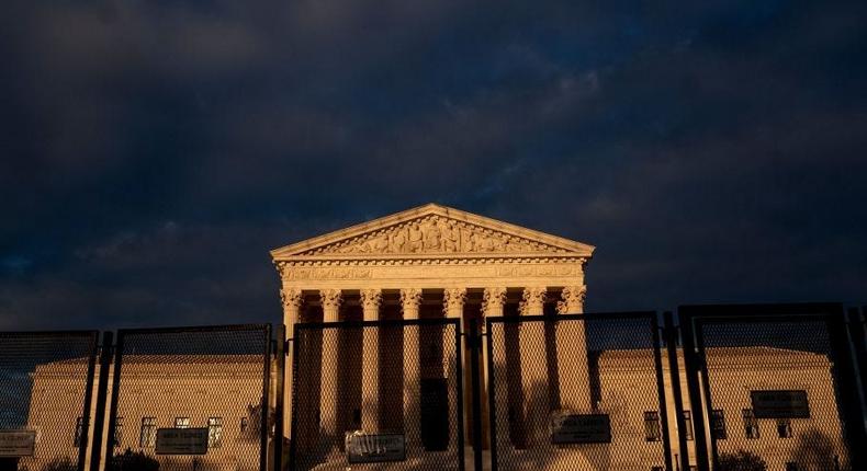 The US Supreme Court is seen behind fences in Washington, DC, on May 11, 2022.