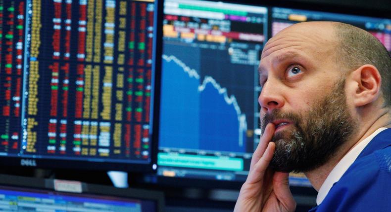 A trader reacts as he watches screens on the floor of the New York Stock Exchange in New YorkReuters/Brendan McDermid