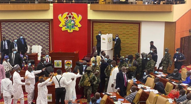 Armed security personnel storm Parliament to restore calm