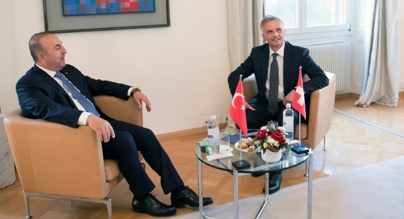 Turkish Foreign Minister Mevlut Cavusoglu (L) meets with Swiss Federal Councillor Didier Burkhalter (R) on March 23, 2017 in Bern, Switzerland