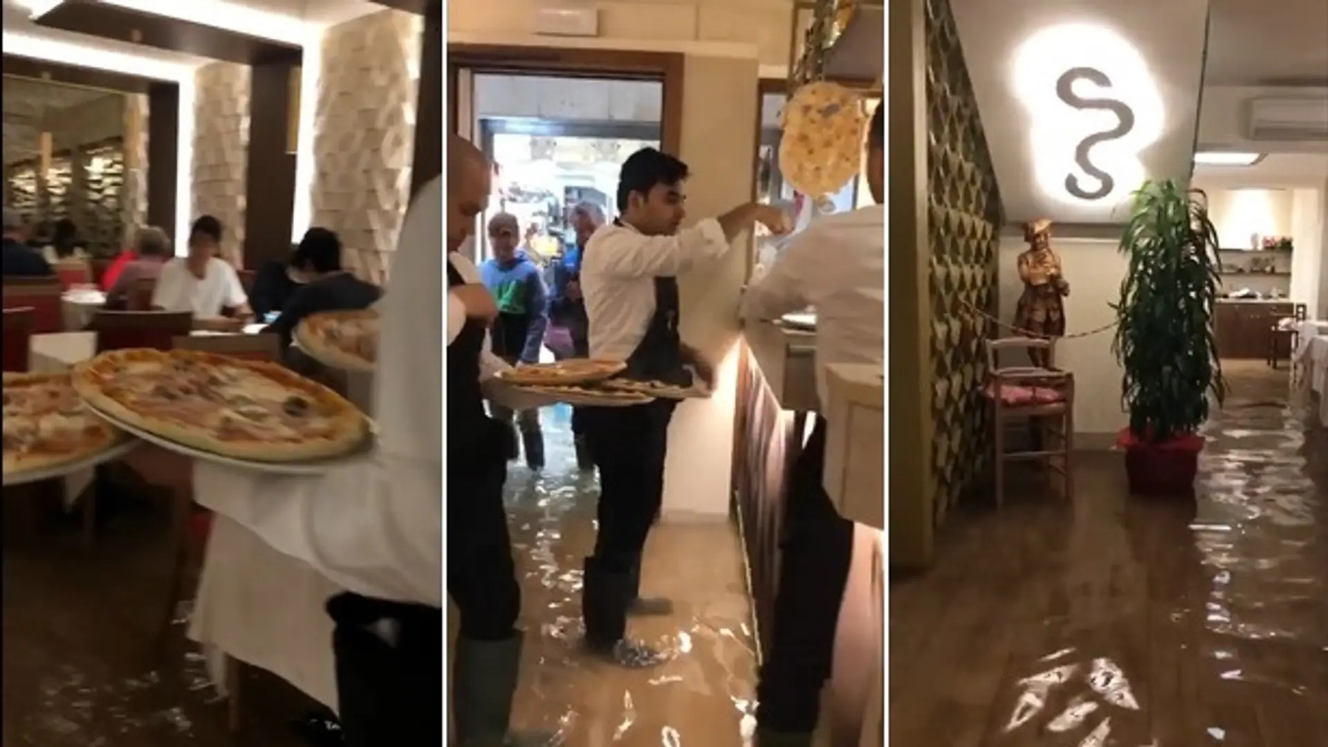 Tłum ludzi w zalanej restauracji w Wenecji. Klienci jedzą pizzę w kaloszach