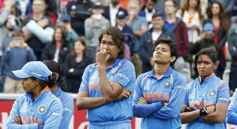 India's women's team wait to collect their runners-up medals after defeat to England in the World Cup final at Lord's on July 23, 2017