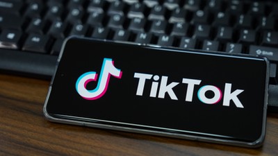 Illustration of TikTok logo displayed on the screen of a smartphone.Getty Images