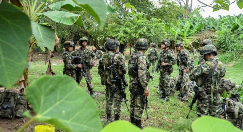 Colombian soldiers arrive at the site where Venezuelan soldiers would have installed a camp in Colombian territory, in Arauquita, department of Arauca, Colombia, on March 23, 2017