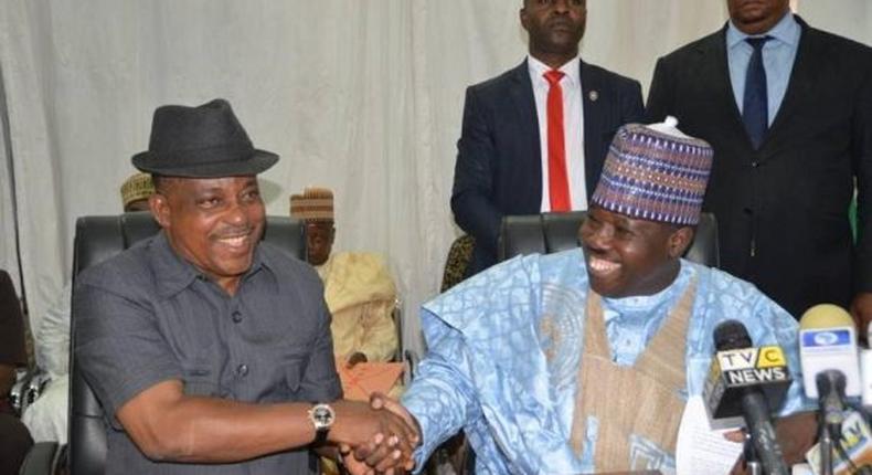 Former PDP Acting Chairman, Uche Secondus hands over to the party’s new chairman, Ali Modu Sheriff on February 22, 2016, at the party's secretariat in Abuja.