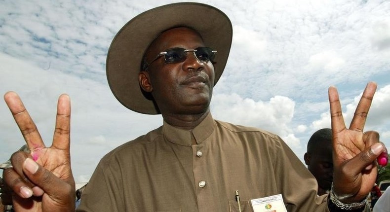 Former Minister of Information Jonathan Moyo makes a victory signs after casting his vote in a file photo. REUTERS/Juda Ngwenya