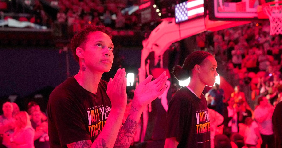 Brittney Griner is standing for the national anthem and the 'uniquely