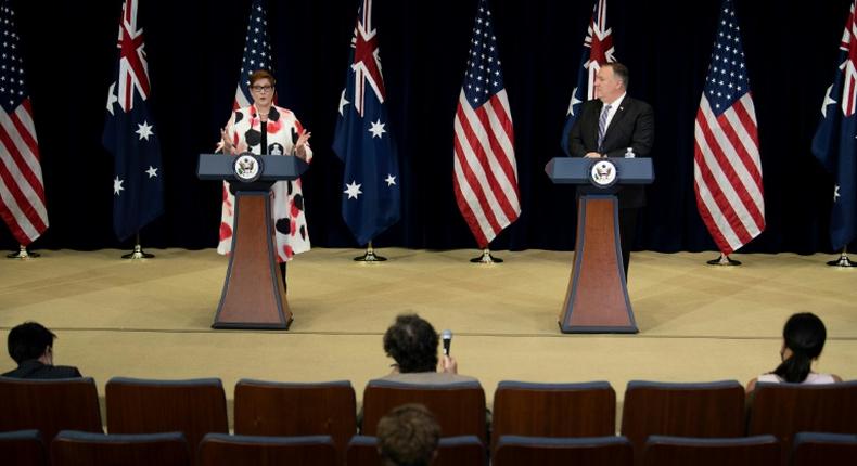 US Secretary of State Mike Pompeo listens while Australia's Foreign Minister Marise Payne speaks during a press conference