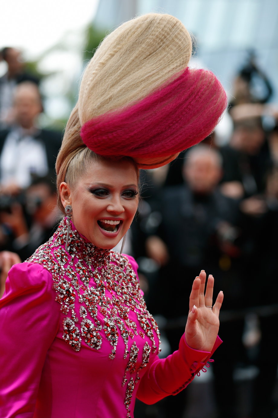 Russian TV star Elena Lenina continues her tradition of arriving on the red carpet with an insane hairstyle.