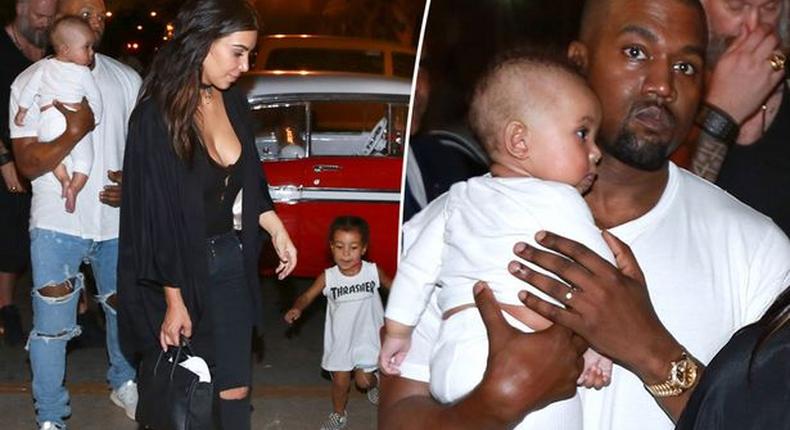 Kim Kardashian and Kanye West with their kids