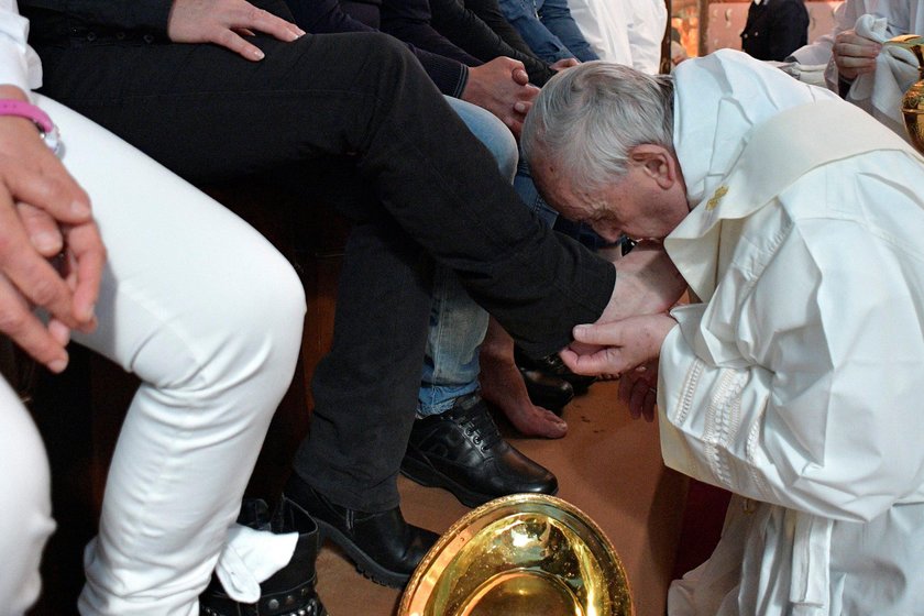 Pope Francis washes the feet of some inmates at the Paliano prison, south of Rome