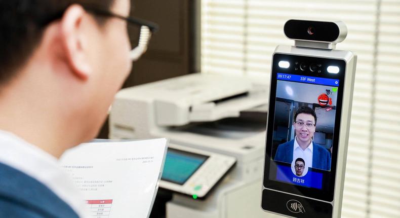 Canon's smiling face recognition requires a positive expression to print documents.
