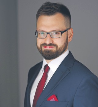dr Michał Mostowik, adwokat i starszy prawnik w kancelarii DLK Legal