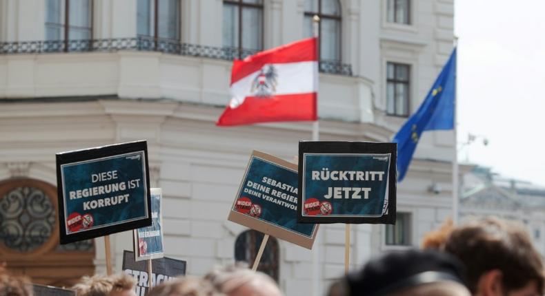 The Ibiza-gate scandal brought down the OeVP-FPOe coalition in May. Here, protesters' signs read This government is corrupt